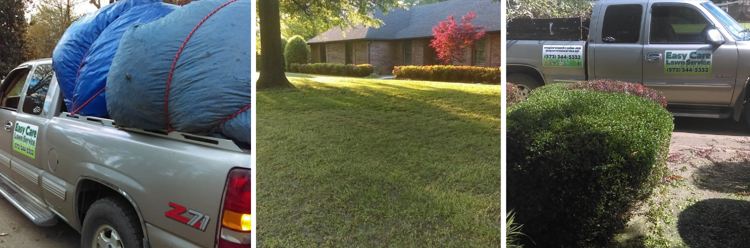 Work truck hauling debris and newly mowed lawns